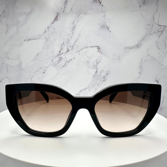 PRADA SPRA09 1AB0A6 black cat eye sunglasses with brown lens for women front view.