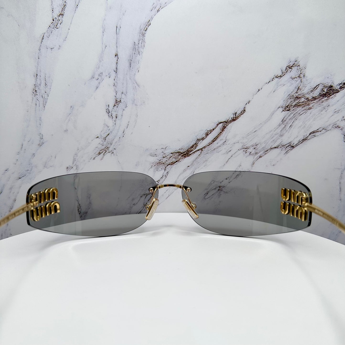 MIU MIU MUA51S 5AK50K Sunglasses Gold Rimless Wrap Square