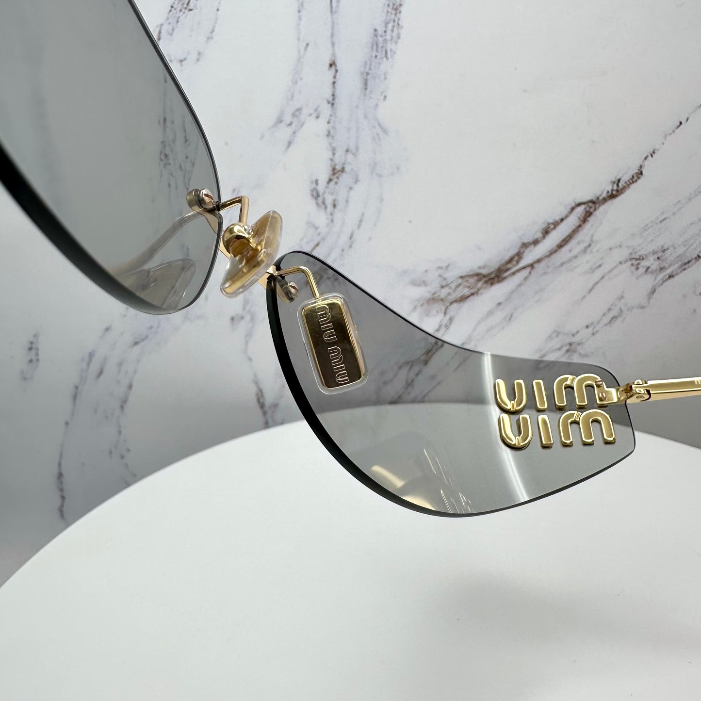 MIU MIU MUA51S 5AK50K Sunglasses Gold Rimless Wrap Square