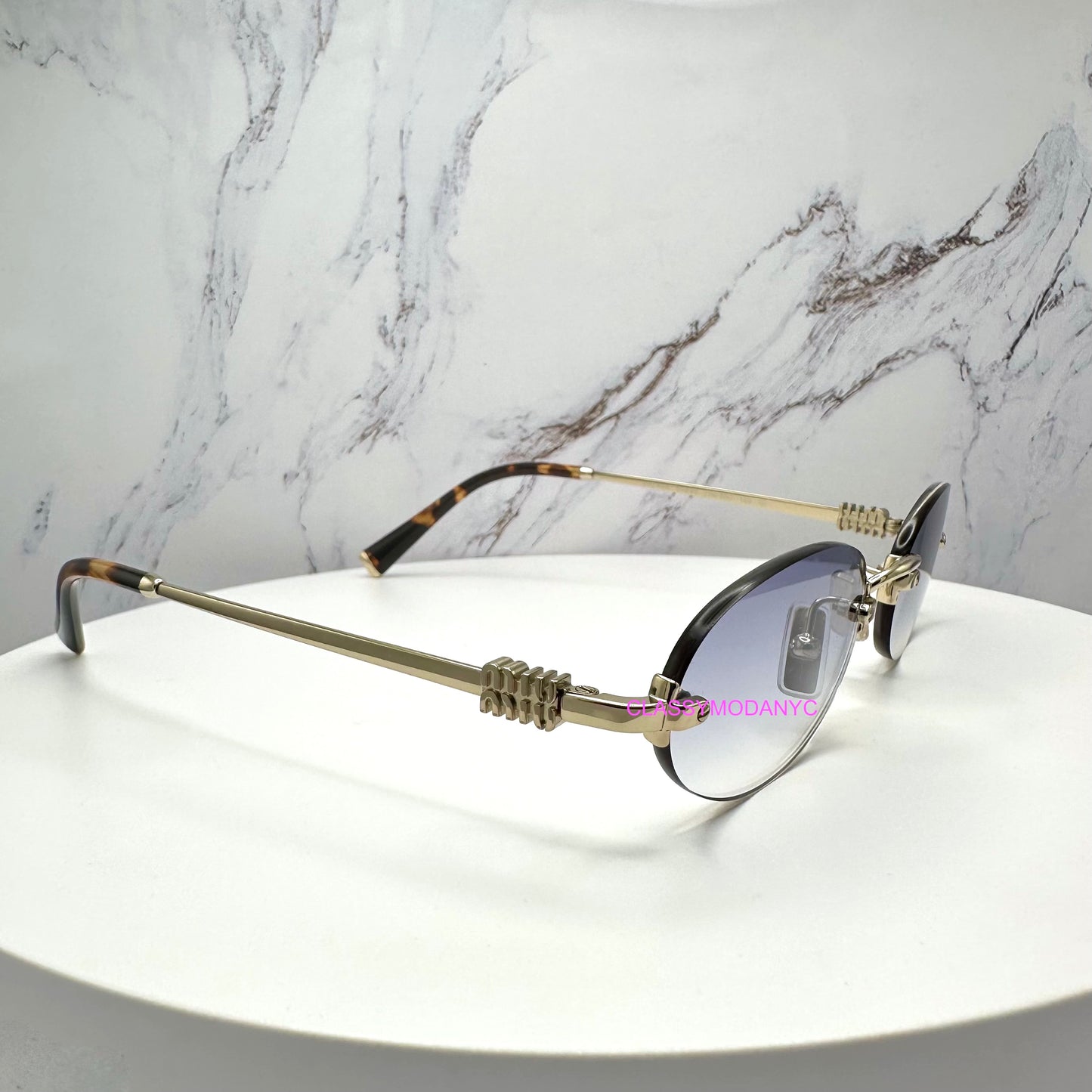 MIU MIU MUA54S ZVN800 Sunglasses Rimless Oval Gold