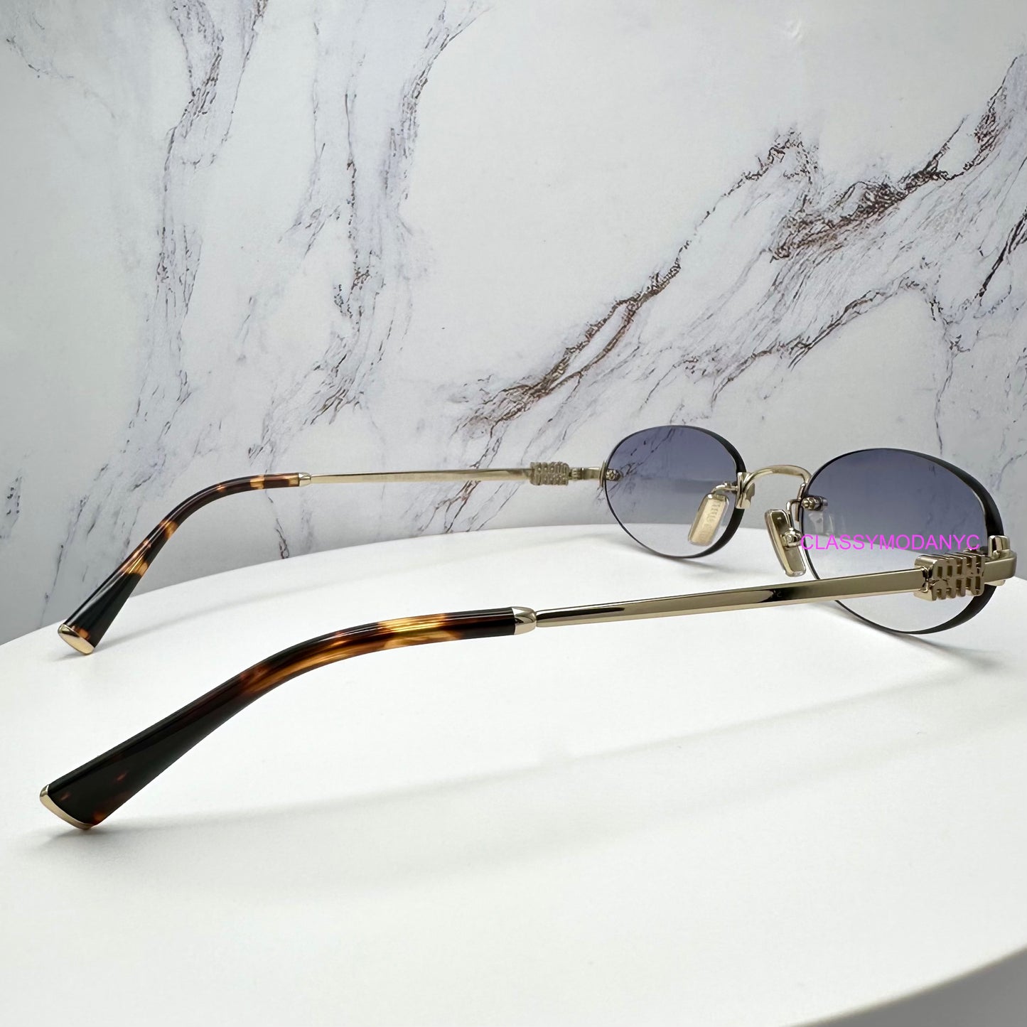 MIU MIU MUA54S ZVN800 Sunglasses Rimless Oval Gold