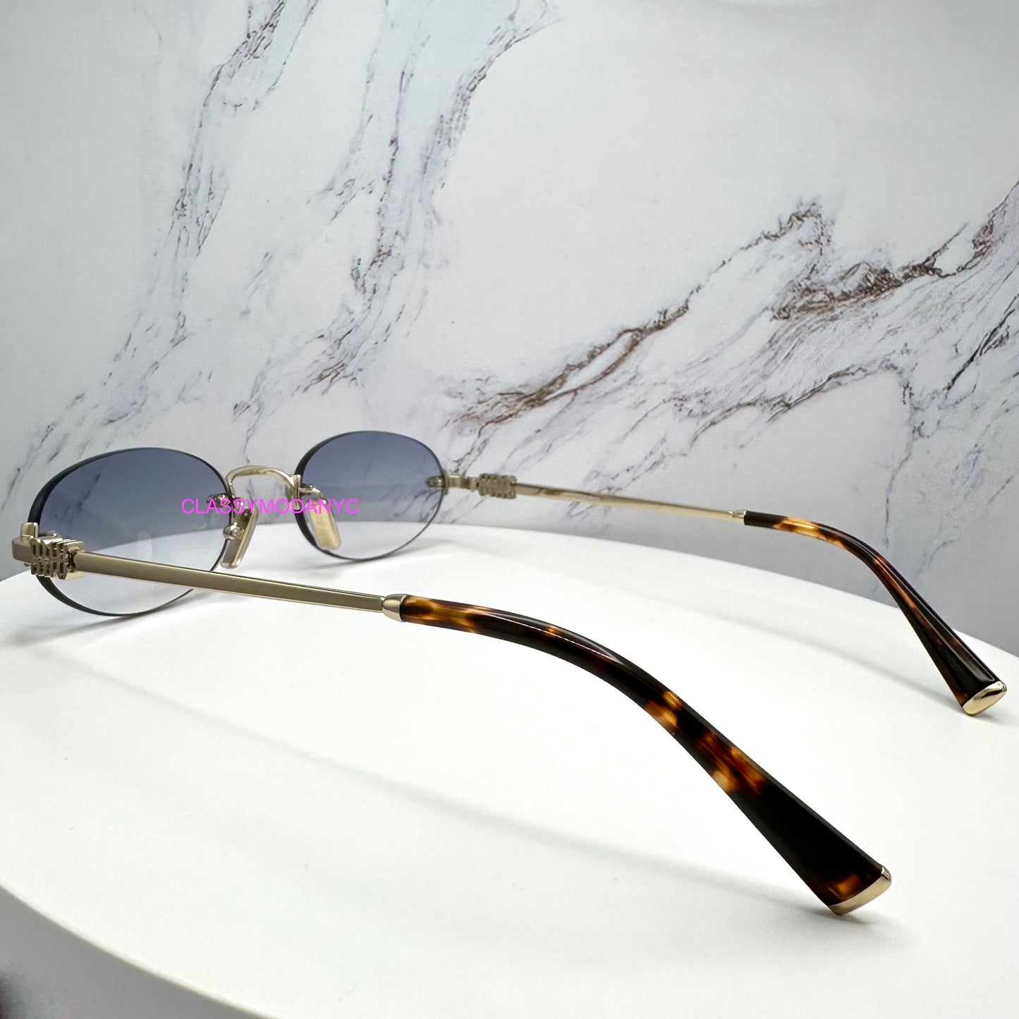MIU MIU MUA54S ZVN800 Sunglasses Rimless Oval Gold
