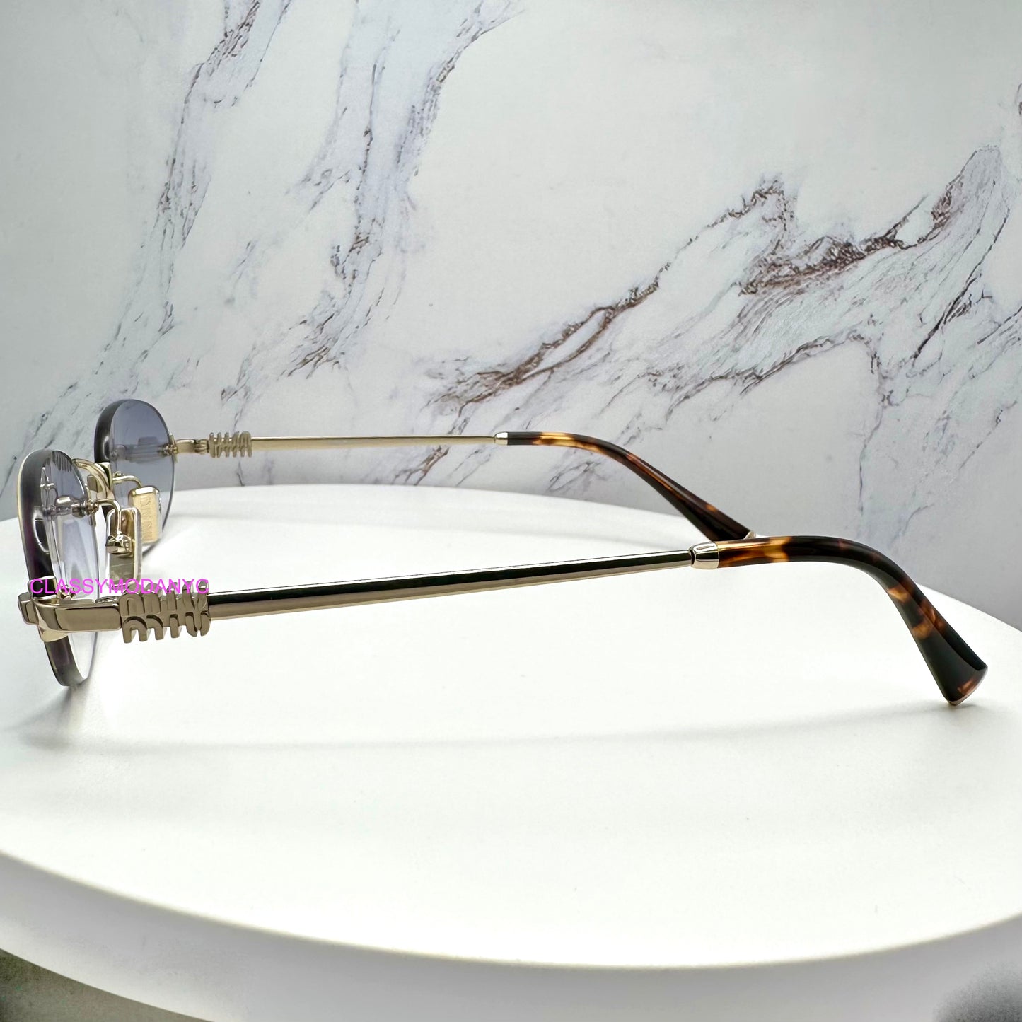 MIU MIU MUA54S ZVN800 Sunglasses Rimless Oval Gold