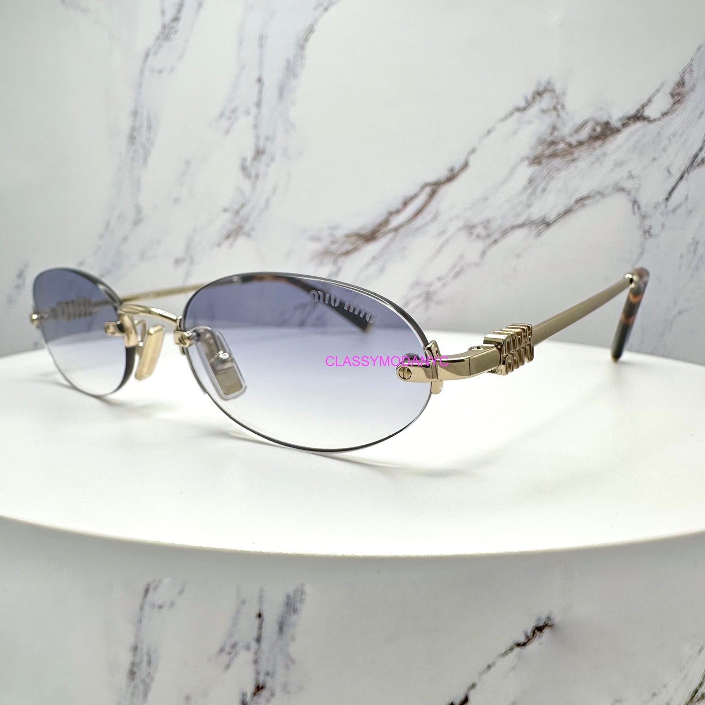 MIU MIU MUA54S ZVN800 Sunglasses Rimless Oval Gold