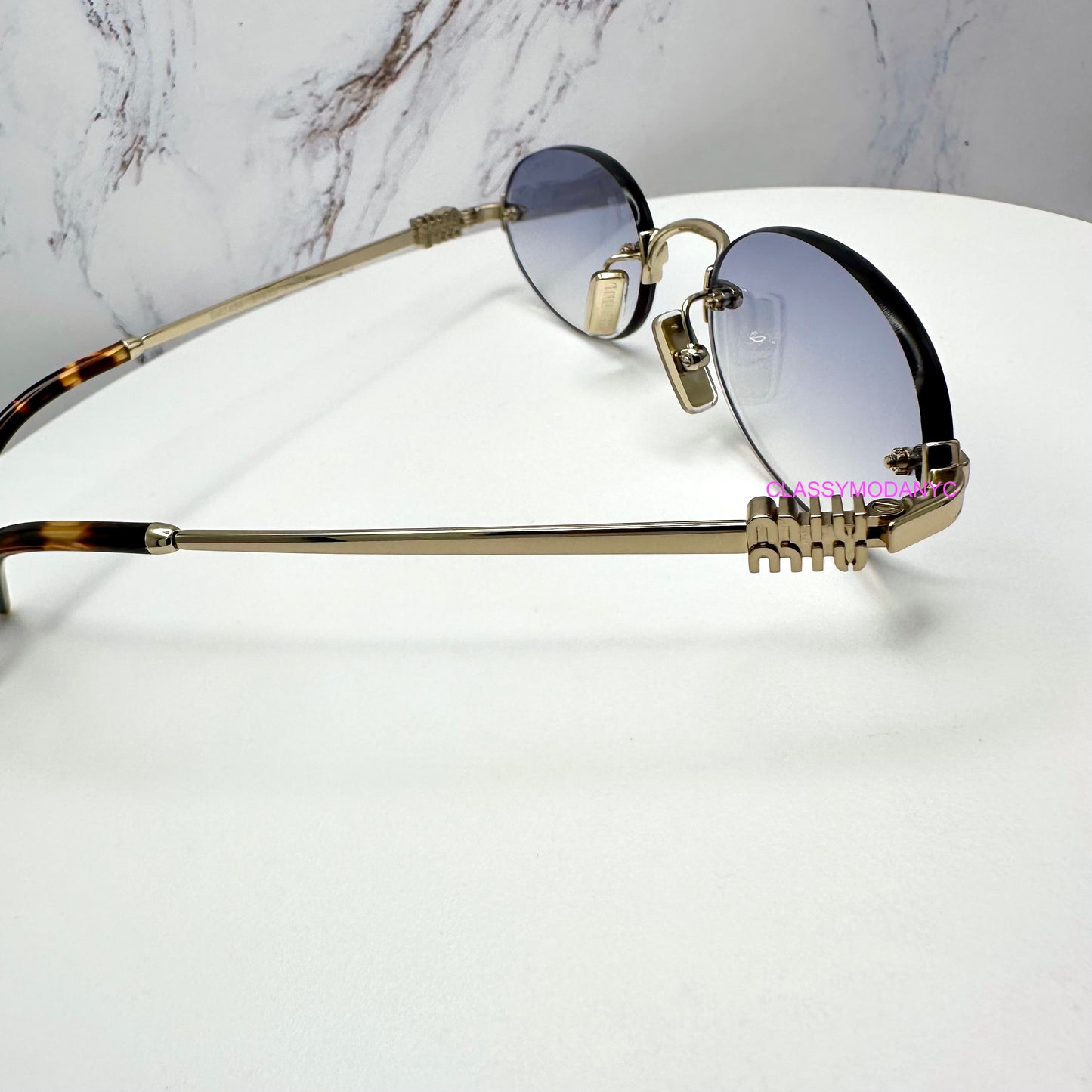 MIU MIU MUA54S ZVN800 Sunglasses Rimless Oval Gold