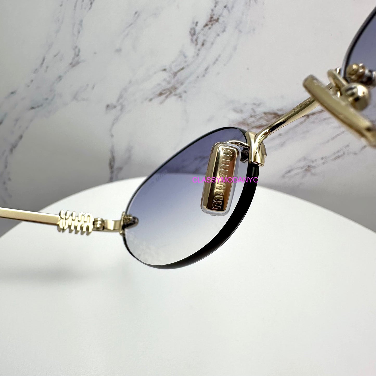 MIU MIU MUA54S ZVN800 Sunglasses Rimless Oval Gold