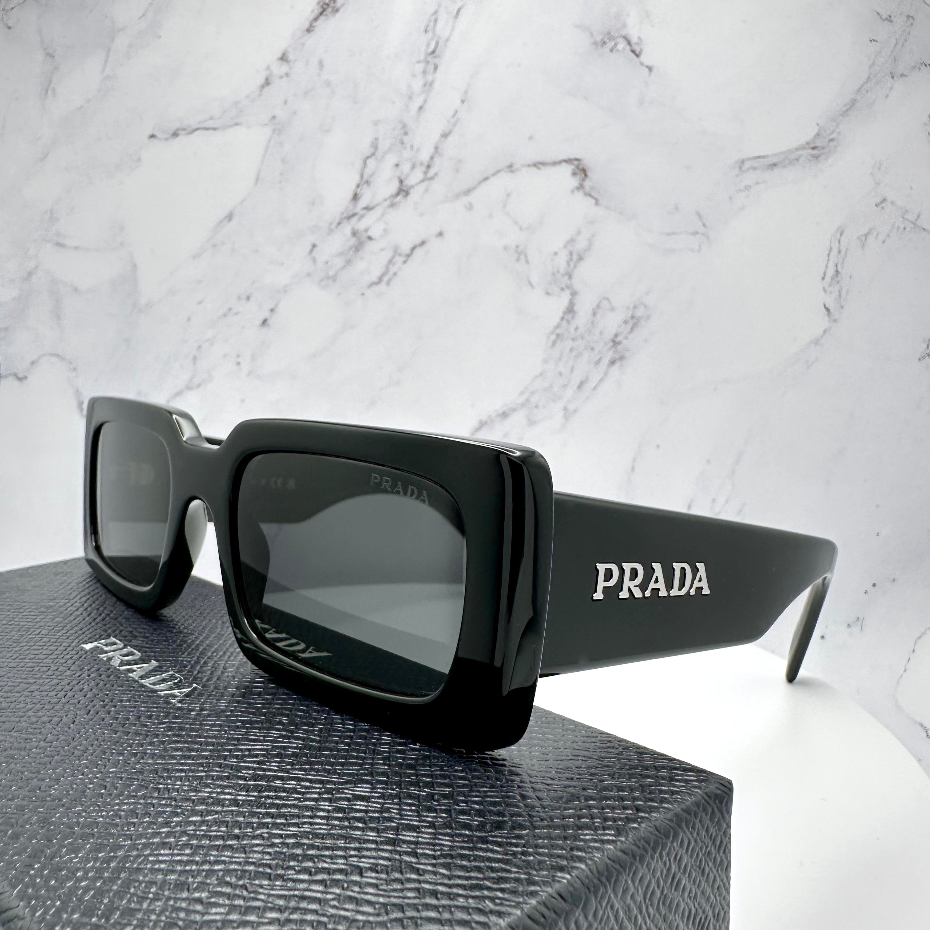 Prada black frame glasses deals