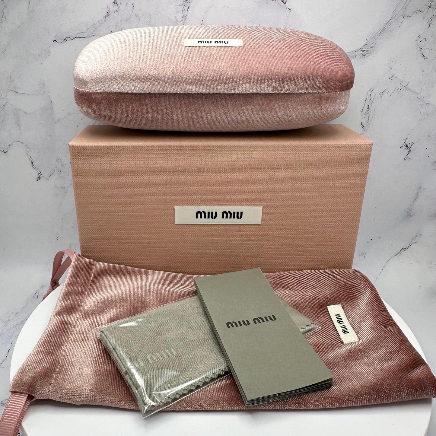 MIU MIU MU04ZS VAU50D box and case.