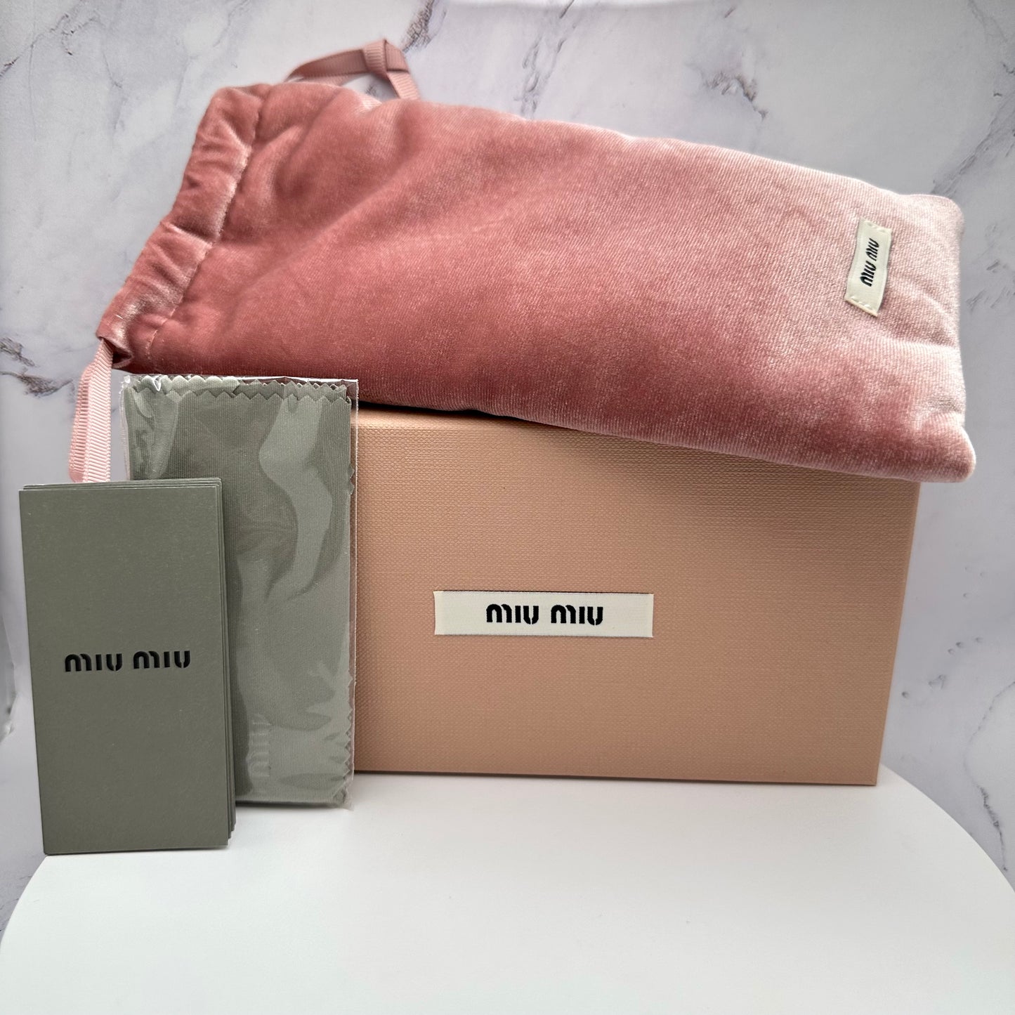 MIU MIU MUA51S 5AK50K Sunglasses Gold Rimless Wrap Square