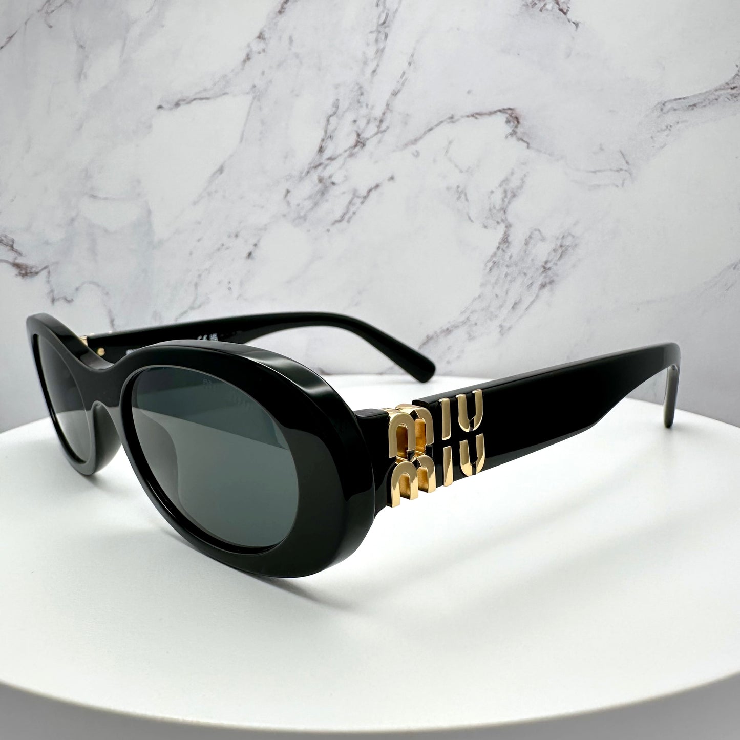 MIU MIU Sunglasses Black Gold Oval MU06ZS 1AB-5S0