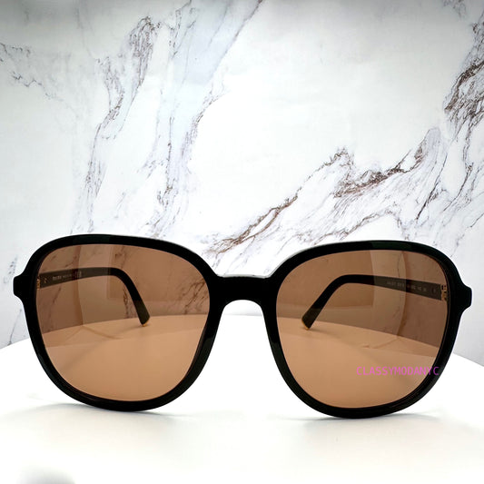 SMUB01 16K90Q MIU MIU black oversized sunglasses front view