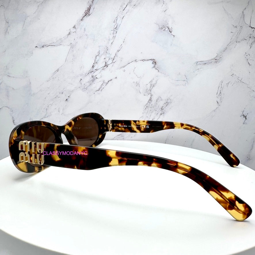 MU 06ZS VAU06B Miu Miu Sunglasses UPC 8056597989077