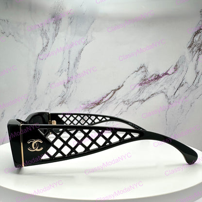5566 1850/S4 Black Chanel sunglasses with lattice tweed design on a marble background