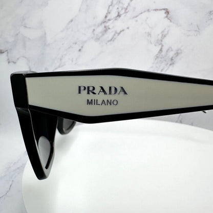 Prada 0PR24ZS 1AB5S0 black white square grey gradient sunglasses side view silver symbole logo