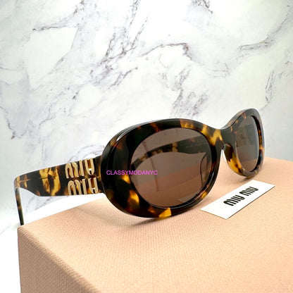MU 06ZS VAU06B Miu Miu Sunglasses UPC 8056597989077
