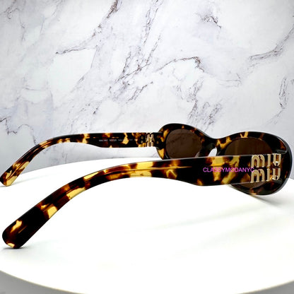 MU 06ZS VAU06B Miu Miu Sunglasses UPC 8056597989077