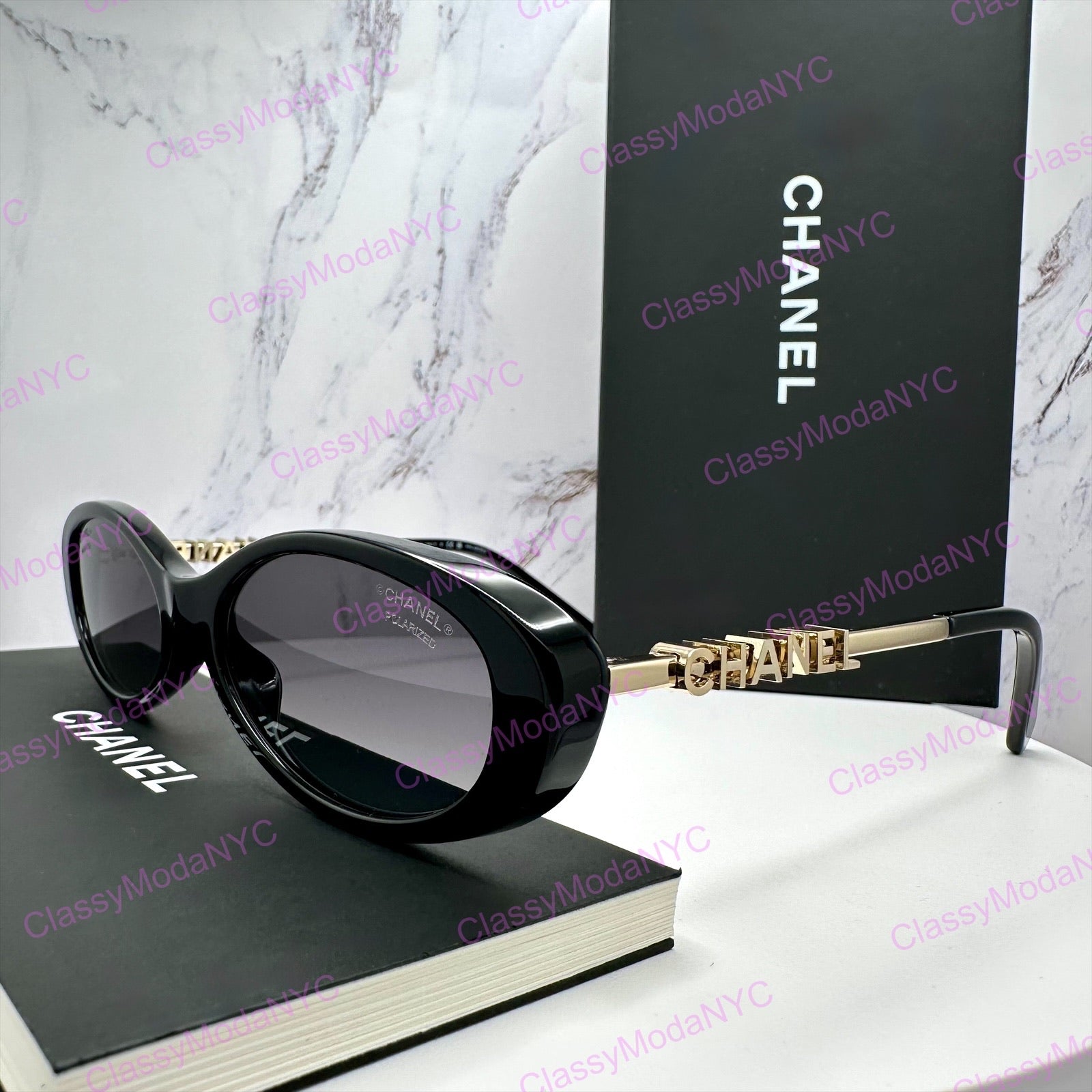 CH5565 C622/S8 Chanel black gold oval womens sunglasses angle view 