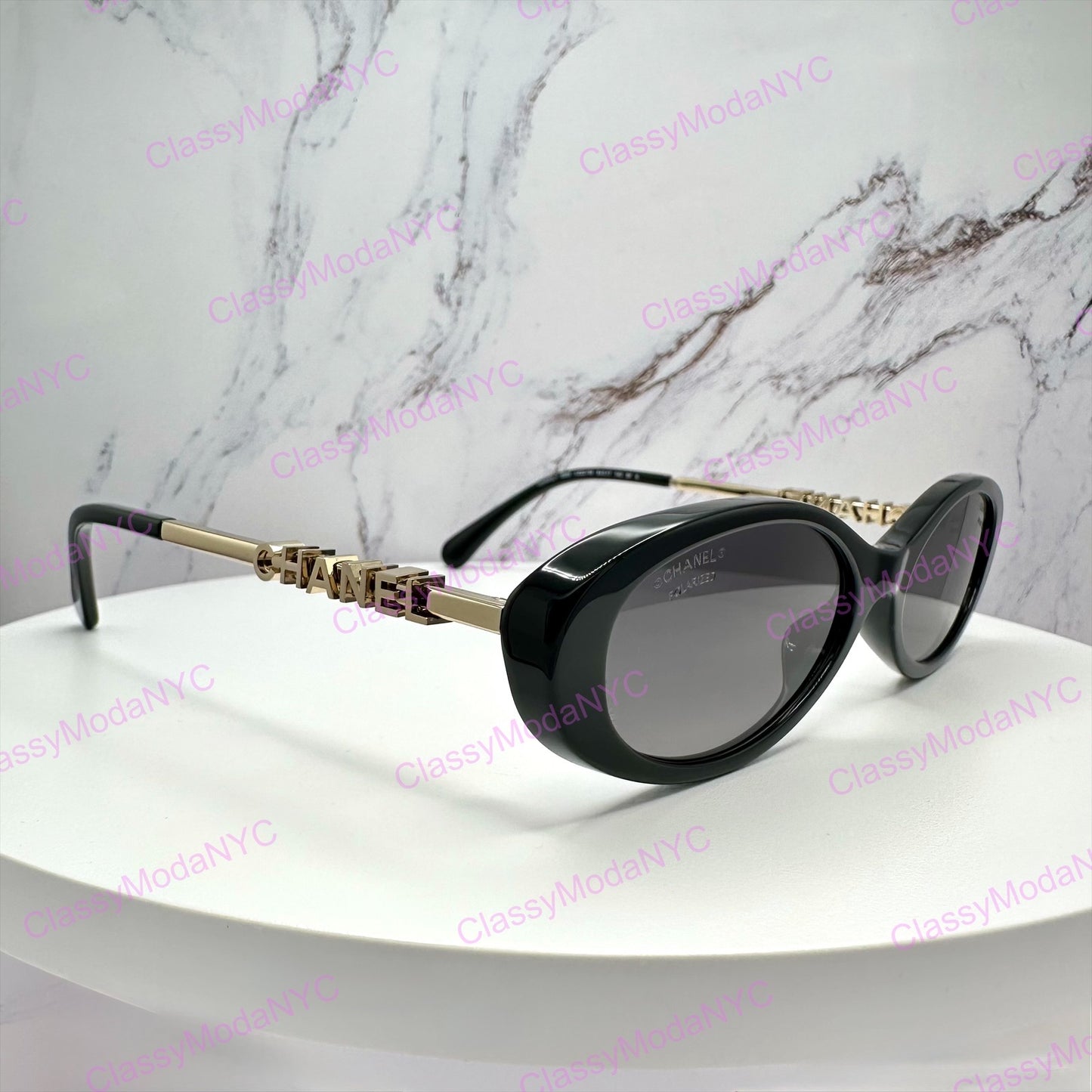 CH5565 C622/S8 Chanel black oval womens sunglasses angle view 