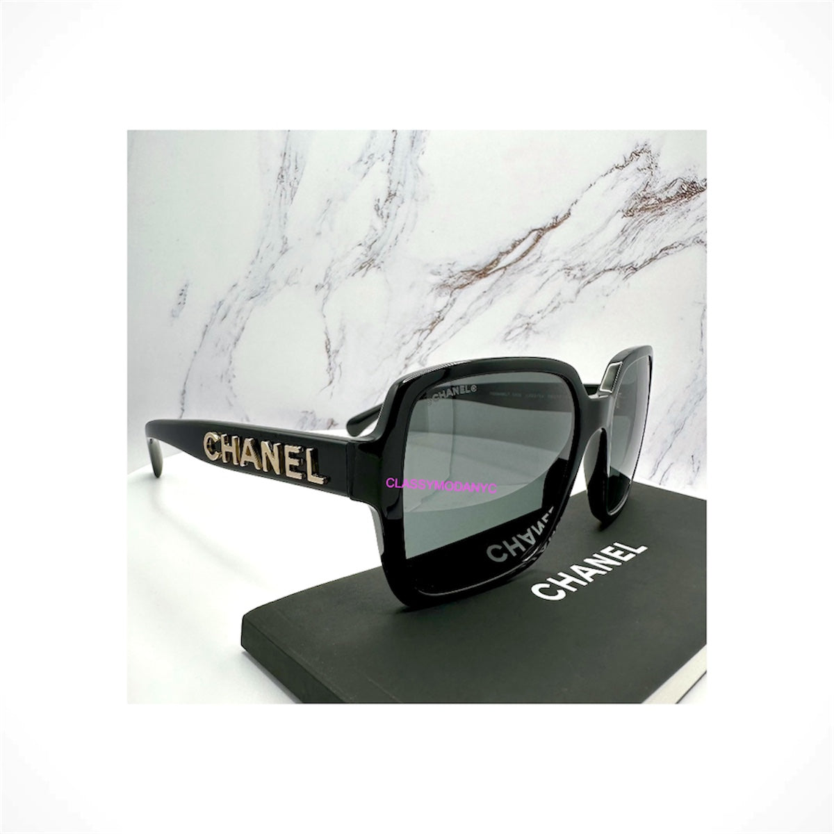 CHANEL 5408 C622/S4 black oversized square acetate sunglasses with 3D gold CHANEL lettering on the temple arms
