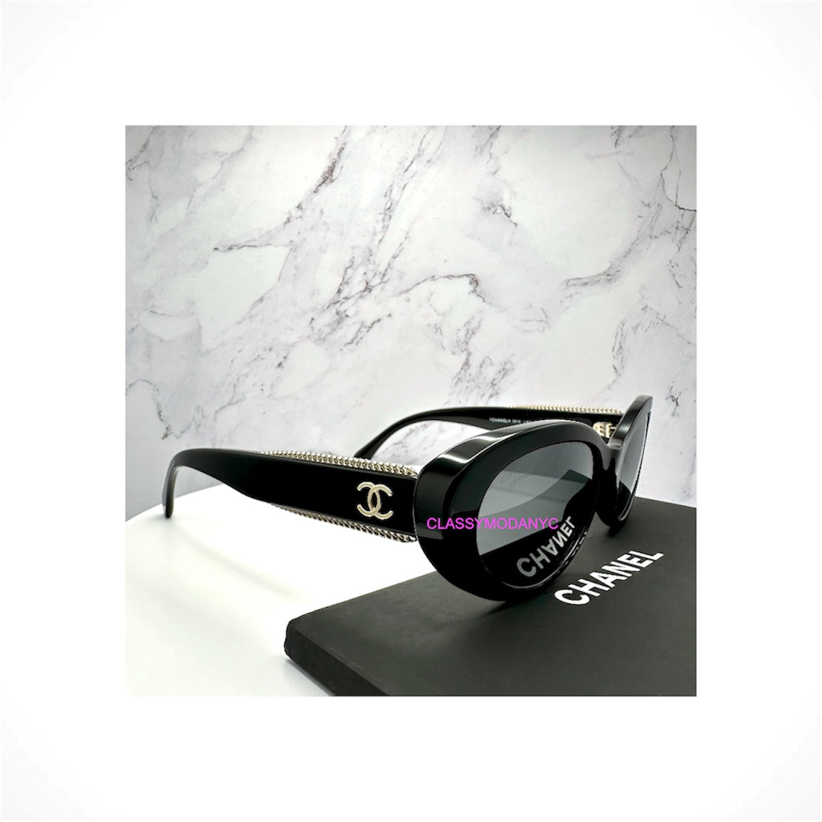 CHANEL 5515 C622/48 women's black oval cat eye polarized sunglasses with grey lenses and gold CC chain detailing