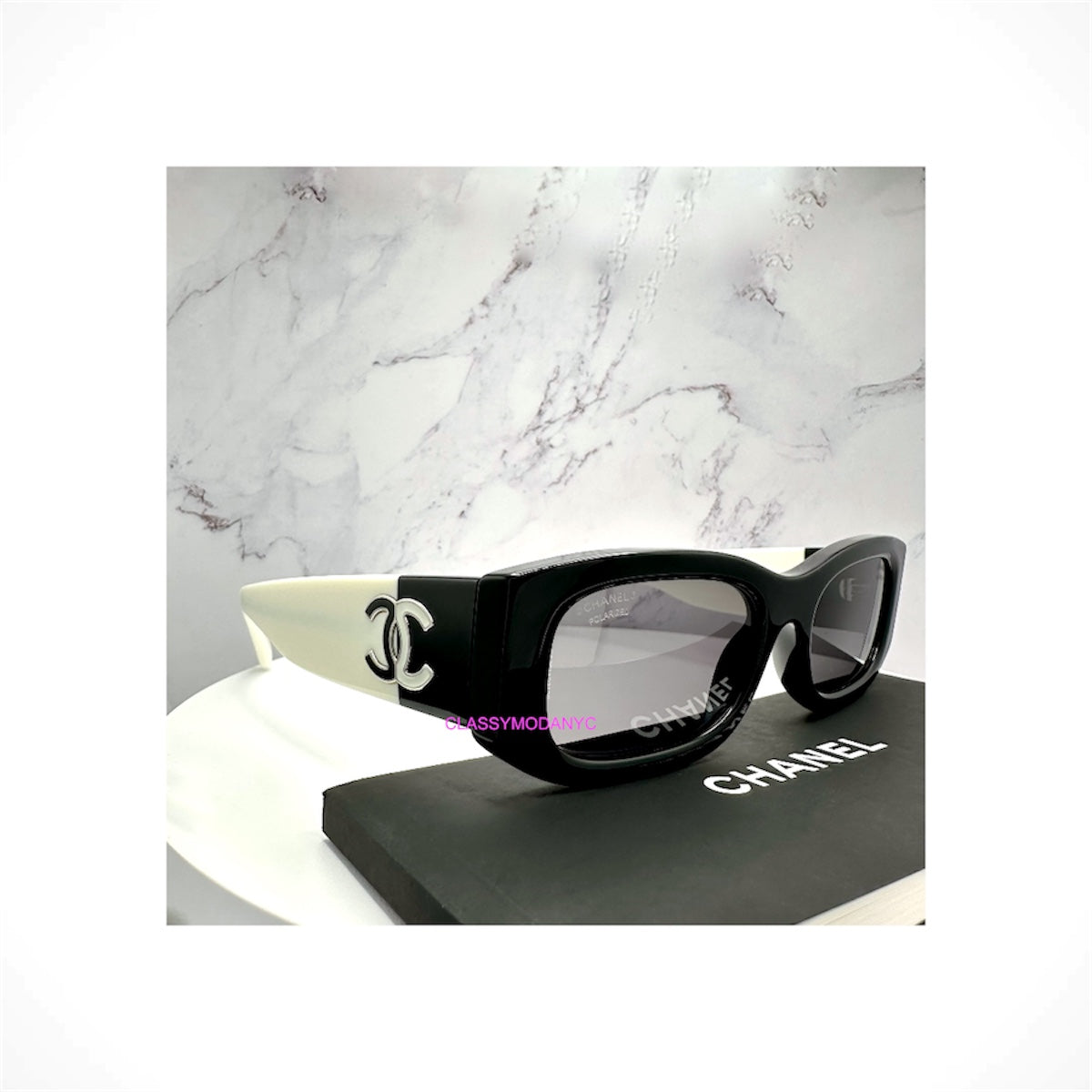 CHANEL 5525 1656/T8 unisex black and white rectangle sunglasses with polarized gray gradient lenses and interlocking CC logos