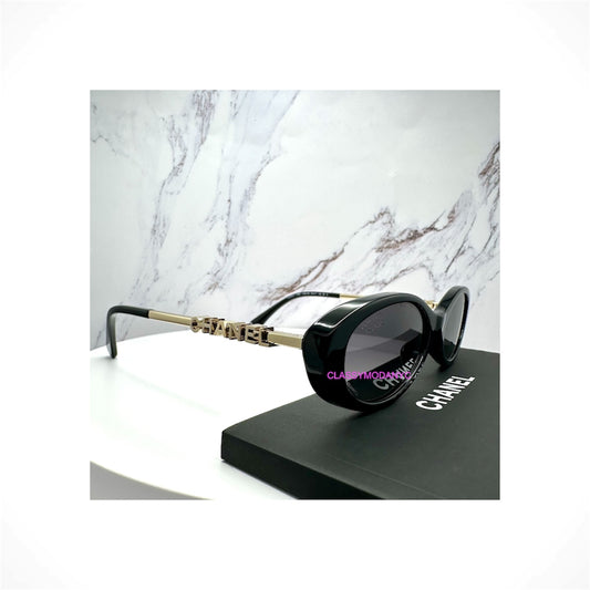 CHANEL 5565 C622/S8 black oval polarized sunglasses with gray gradient lenses and gold CHANEL logo