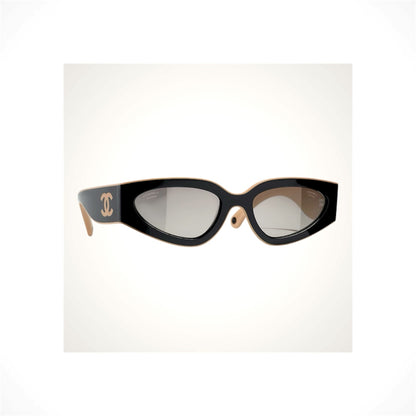 CHANEL 6056 C534/M3 women's black and beige cat-eye polarized sunglasses with gray gradient lenses and CC logo
