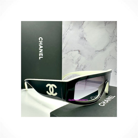 CHANEL 6057 1656/S6 unisex black and white shield wrap sunglasses with gradient gray lenses and interlocking CC logos