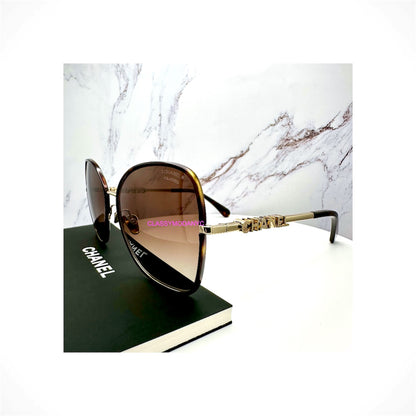 CHANEL CH4283 C429/S9 women's gold and brown butterfly polarized sunglasses with brown gradient lenses and 3D CHANEL logo