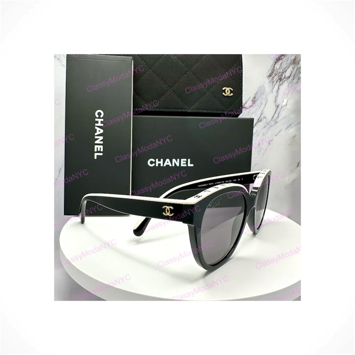 Chanel CH5414 1656/T8 women's black and white butterfly sunglasses with gold CC logo