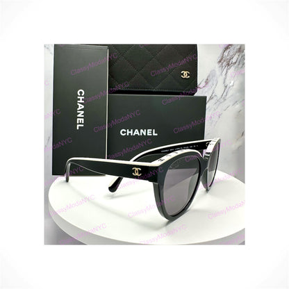 Chanel CH5414 1656/T8 women's black and white butterfly sunglasses with gold CC logo
