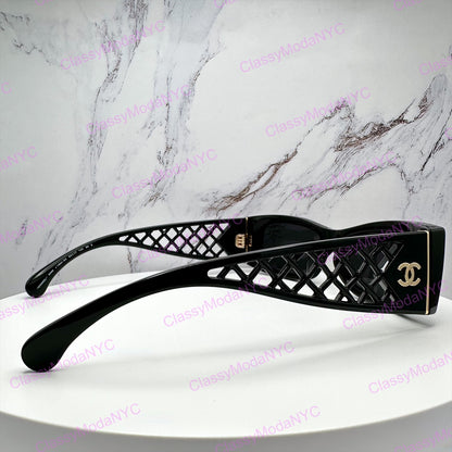 5566 1850/S4 Black Chanel sunglasses with lattice tweed design on a marble background 5