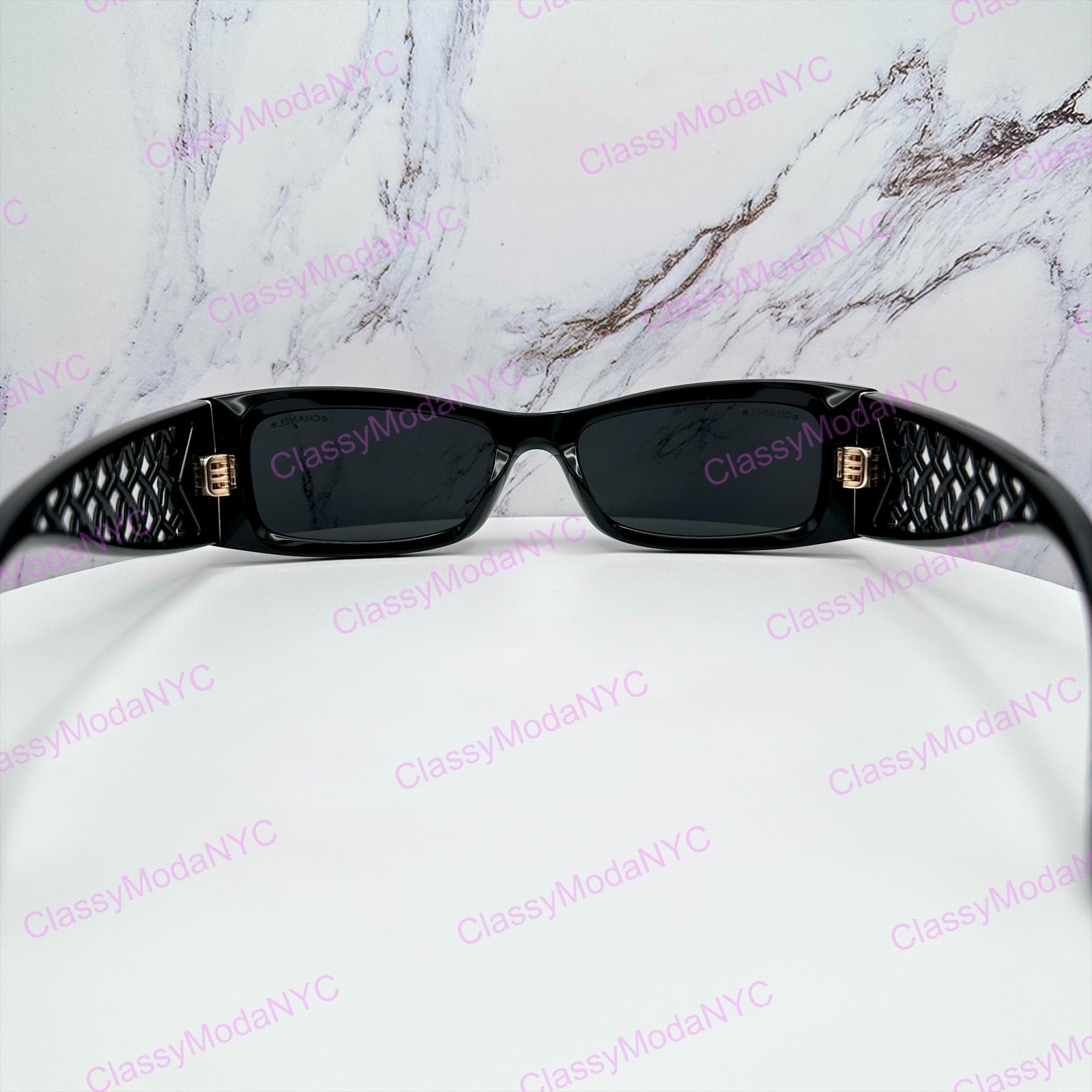 Chanel sunglasses black gold back view rectangular interlocking CC logo 