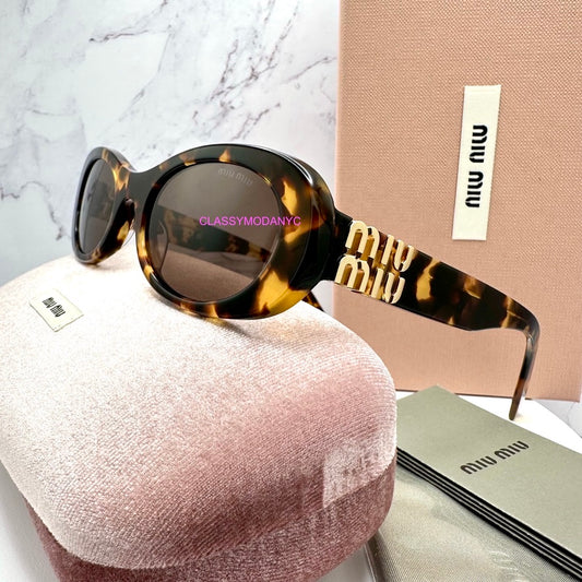 MU 06ZS VAU06B Miu Miu Sunglasses UPC 8056597989077
