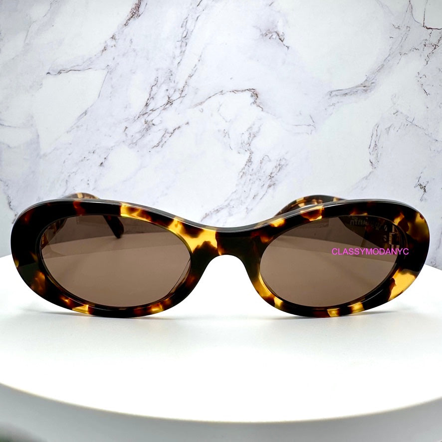 MU 06ZS VAU06B Miu Miu Sunglasses UPC 8056597989077