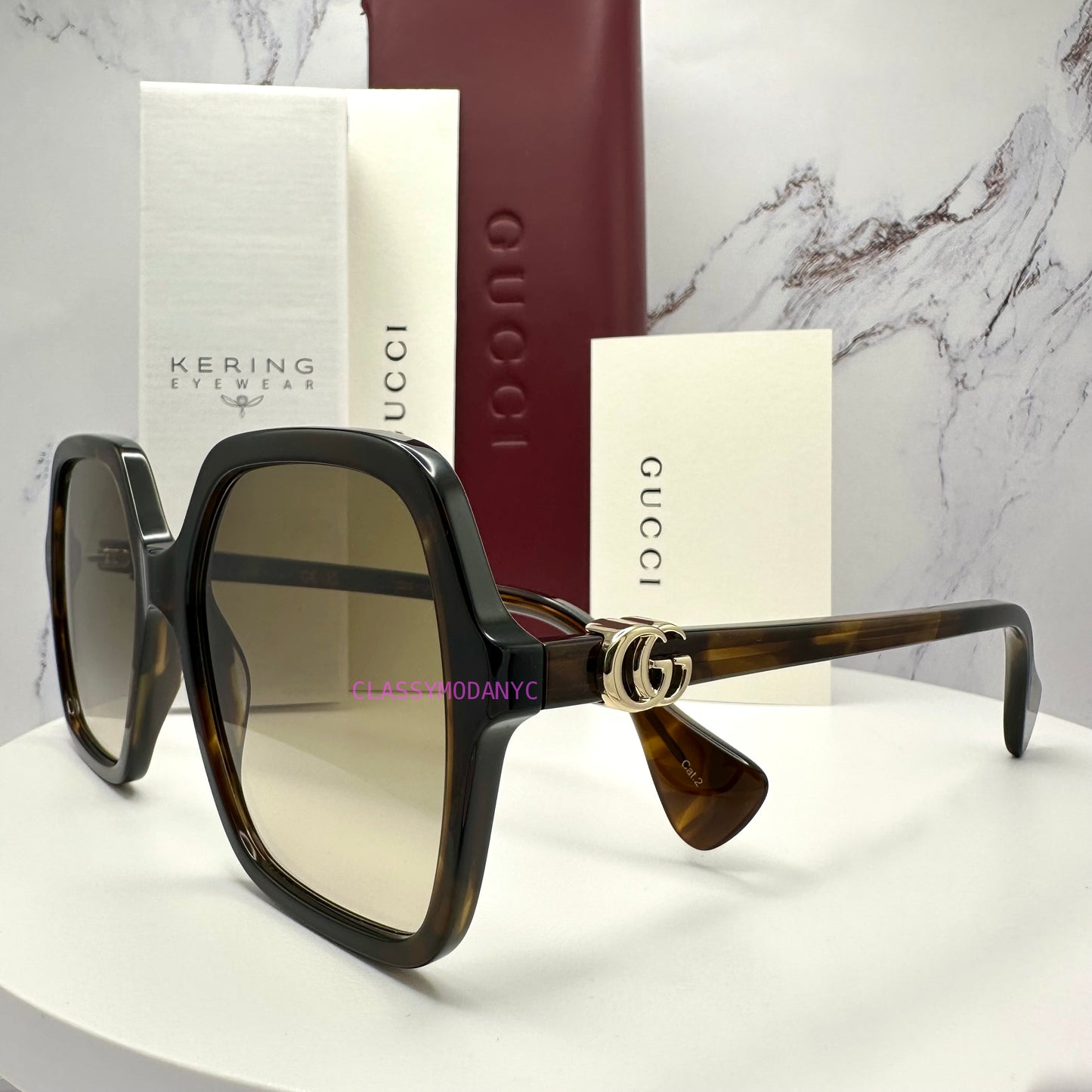 GG1072S 002 Gucci Sunglasses front view brown oversized womens tortoise frames 