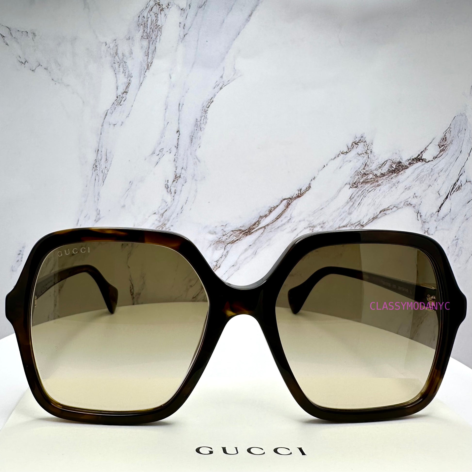 GG1072S 002 Gucci Sunglasses front view 