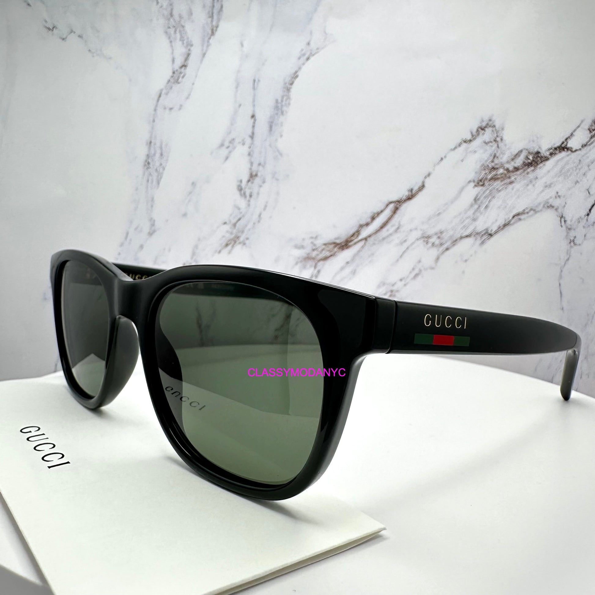 GG1985S 001 Gucci Sunglasses black side view with red green web arm with black case 