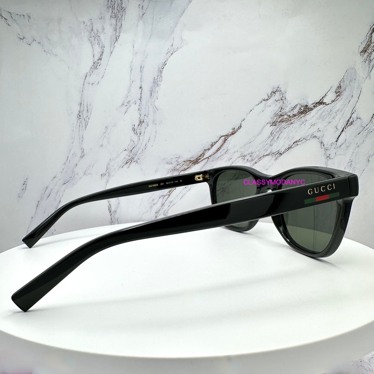 GG1985S 001 Gucci Sunglasses black side view with red green web arm 