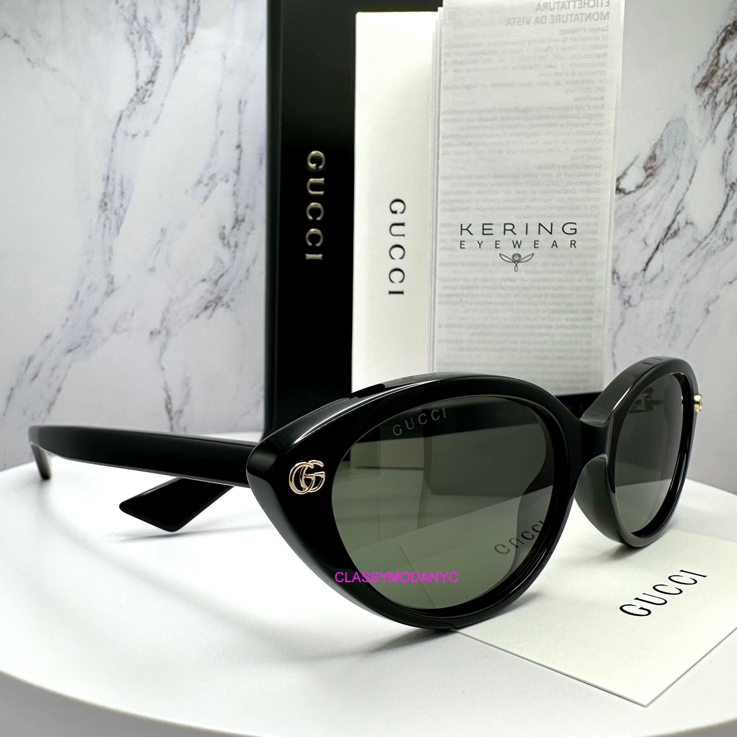 GG2110S 001 black sunglasses gold metal logo women's cat eye with case 
