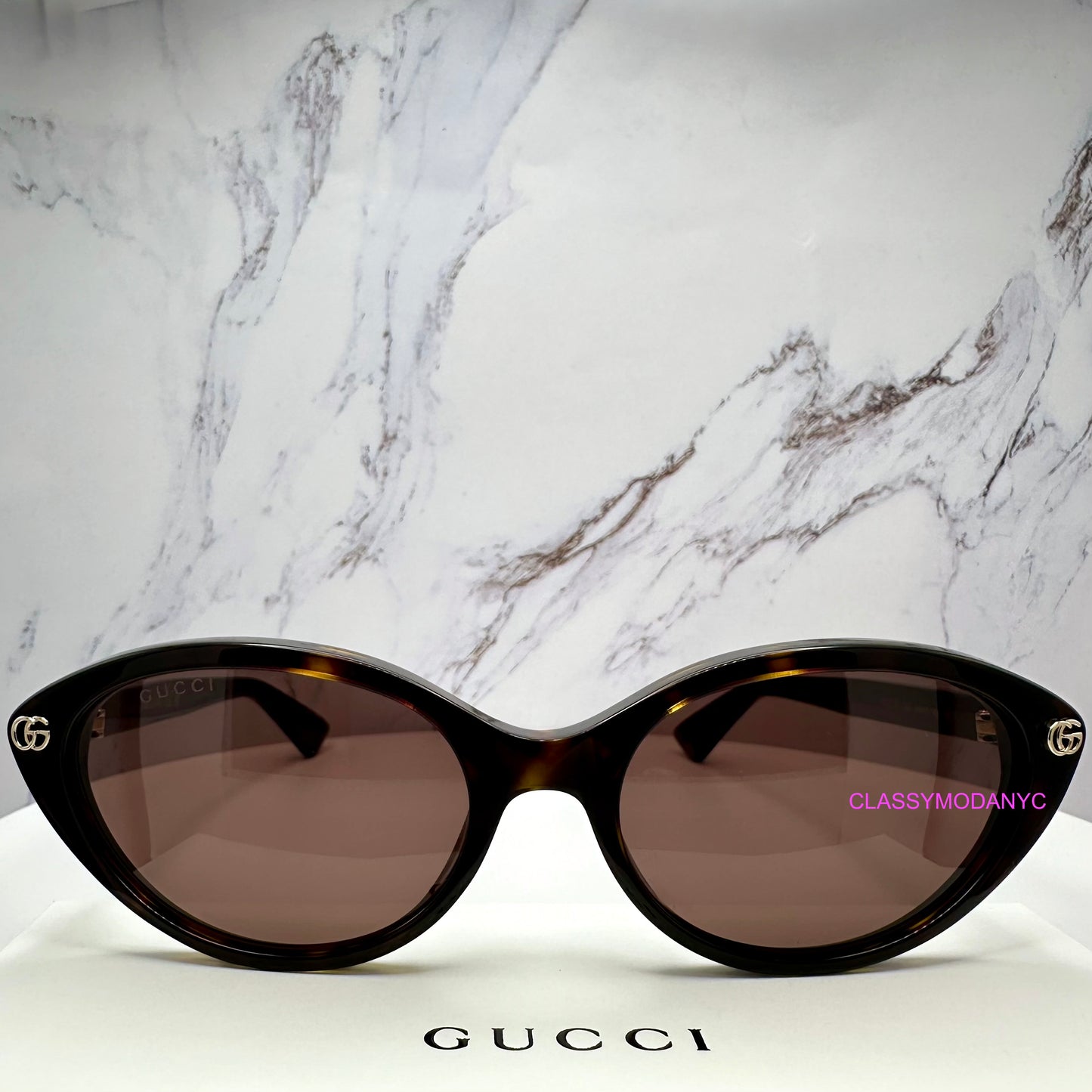 GG2110S 002 Gucci sunglasses brown tortoise front view 