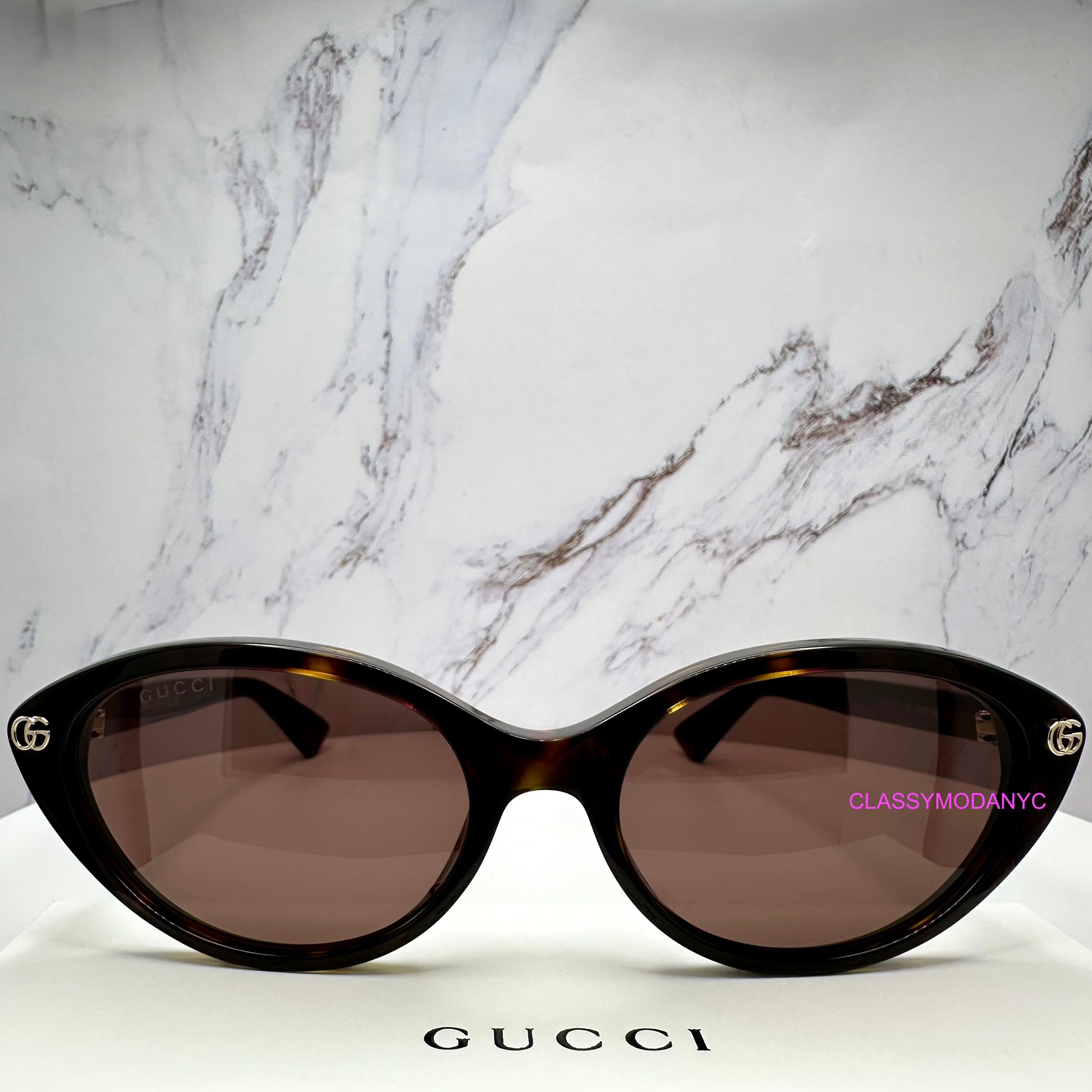 GG2110S 002 Gucci sunglasses brown tortoise front view 