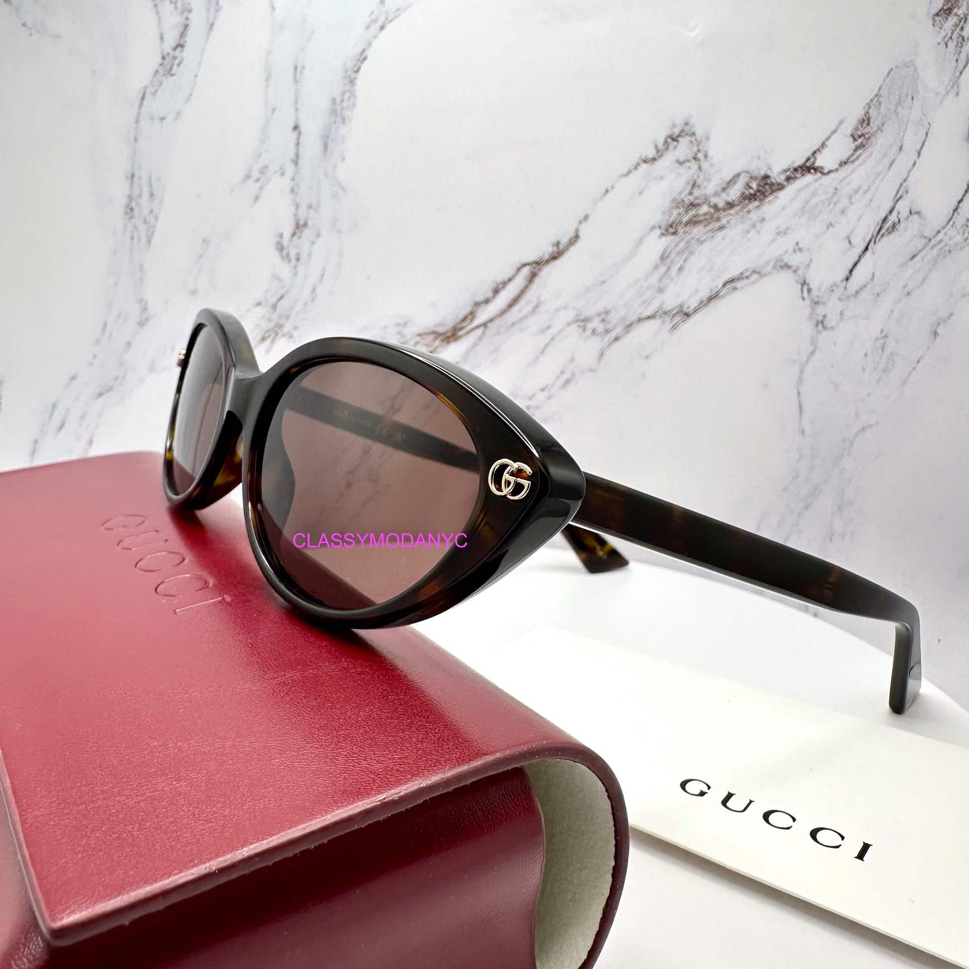 GG2110S 002 Gucci sunglasses side view with case 