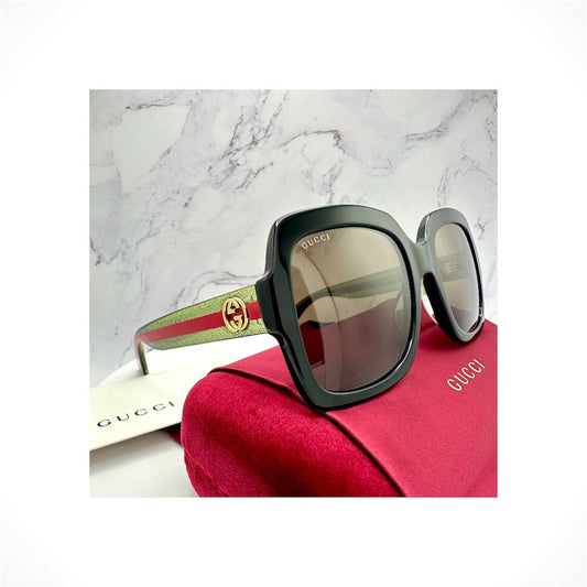 Gucci GG0036SN 002 women's black oversized square sunglasses with gold GG logo and red green web