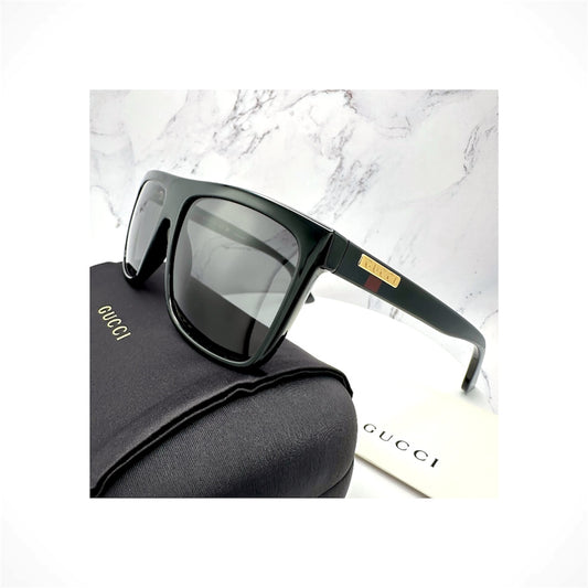 Gucci GG0748S 001 men's black square aviator sunglasses with red and blue web and gold GUCCI logo