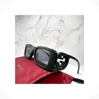 Gucci GG1325S 001 unisex black rectangular sunglasses with black GG logo