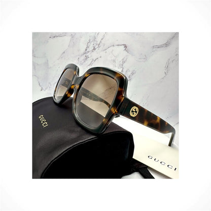 Gucci GG1337S 003 women's brown tortoise oversized square sunglasses with gold GG logo
