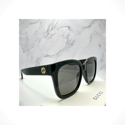 Gucci GG1338S 001 women's black oversized square sunglasses with gold GG logo