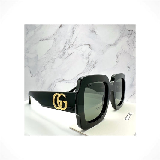 Gucci GG1547S 001 women's black oversized square sunglasses with gold GG logo