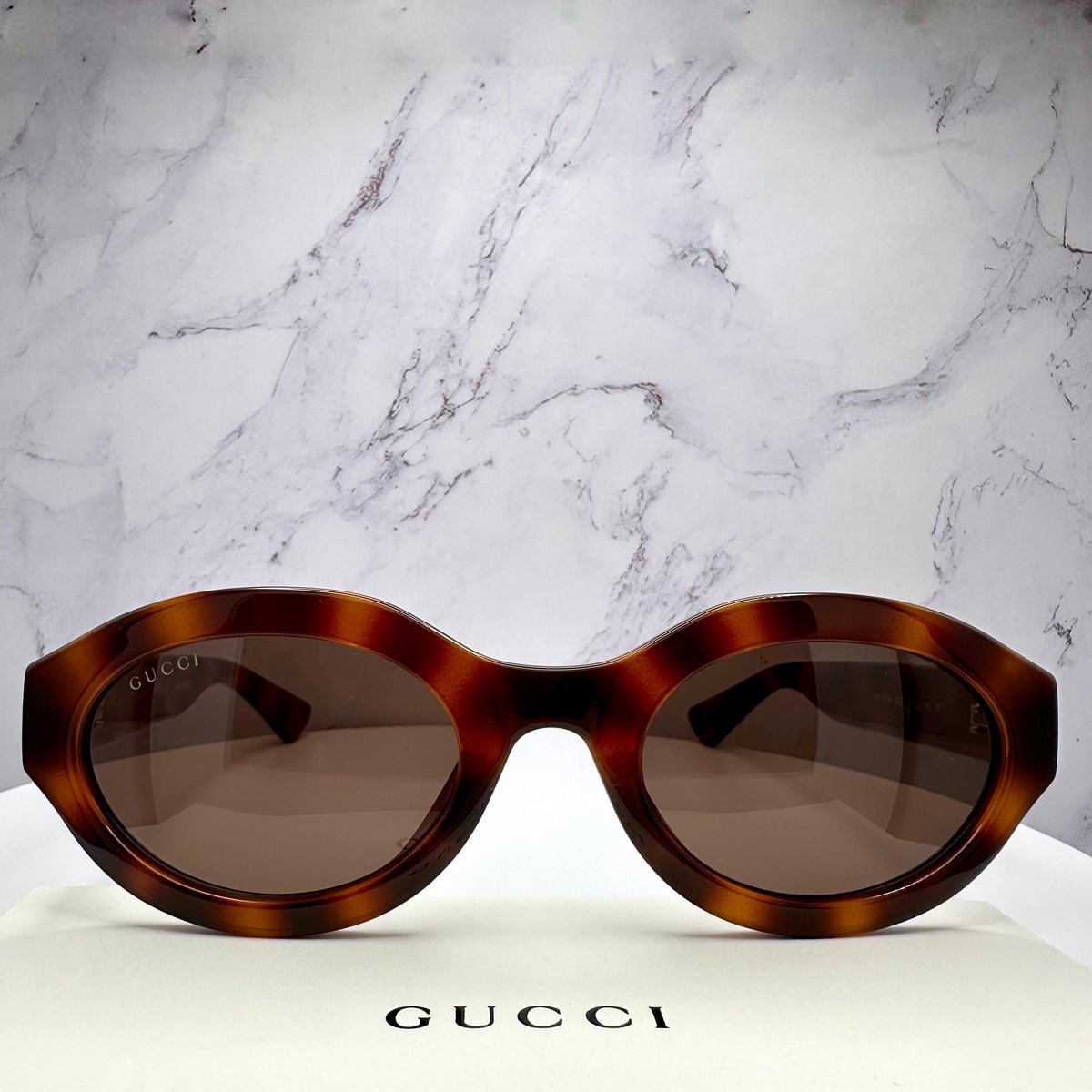 Gucci GG1579S 002 brown oval front frame sunglasses